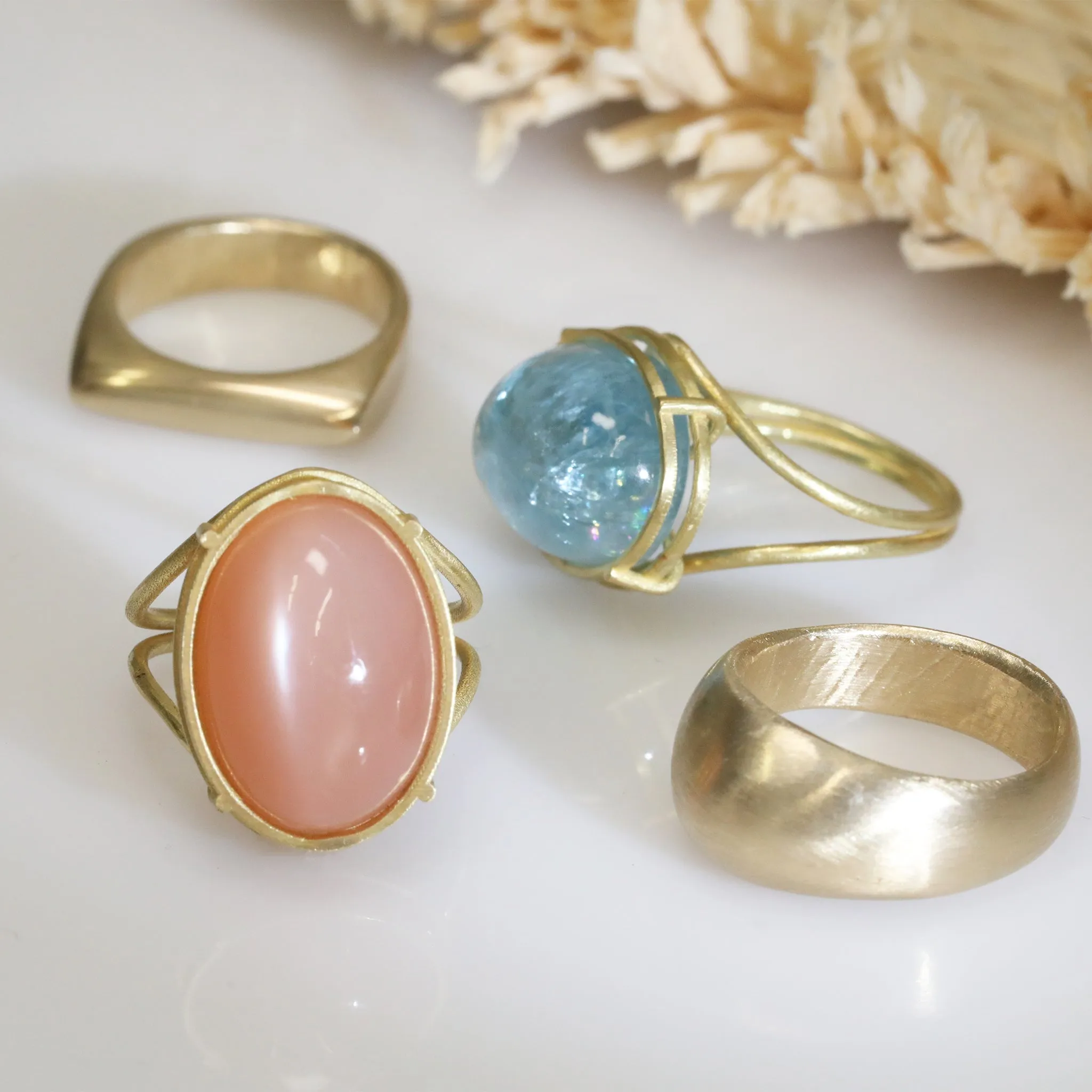 18K Gold and Cabochon Apricot Moonstone Ring in "Cage" Setting
