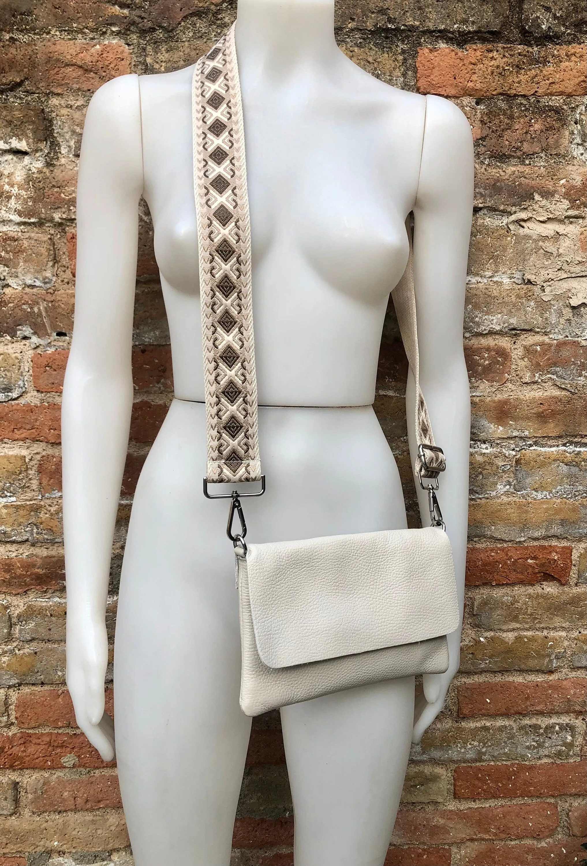 Cream color small leather bag. 2 straps: 1 leather   1 guitar strap. GENUINE leather Crossbody / shoulder bag. Light beige purse with flap
