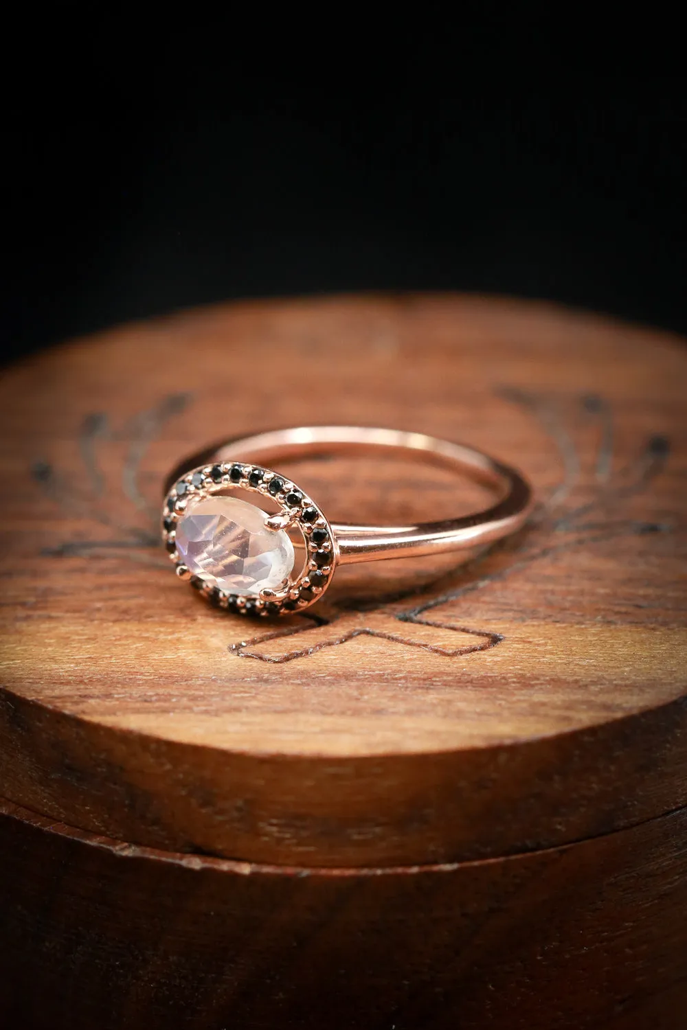 "MONET" - OVAL MOONSTONE ENGAGEMENT RING WITH BLACK DIAMOND HALO