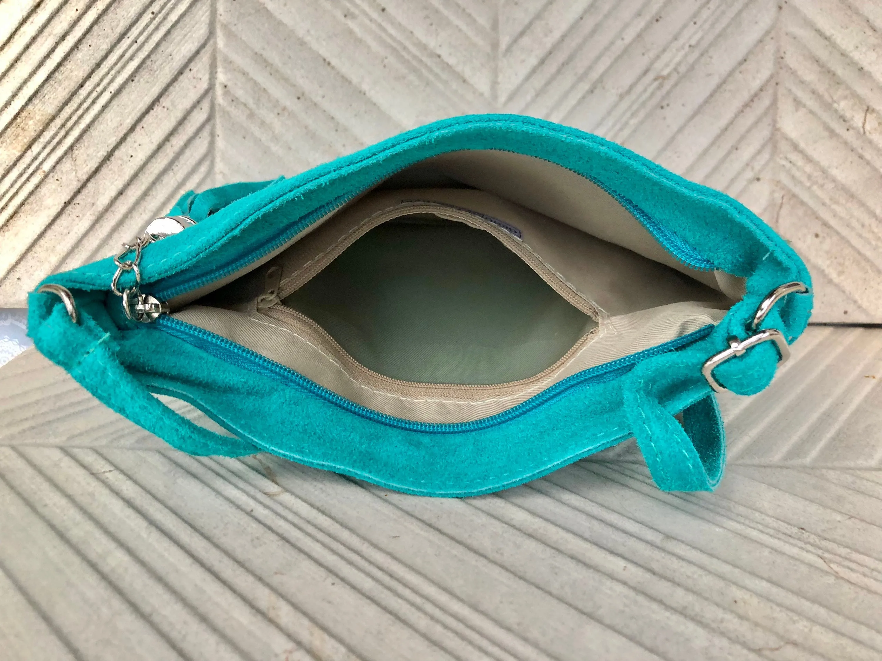 TURQUOISE suede leather bag. GENUINE  leather small crossbody / shoulder bag.Adjustable strap and zipper. Turquoise blue purse with tassel.