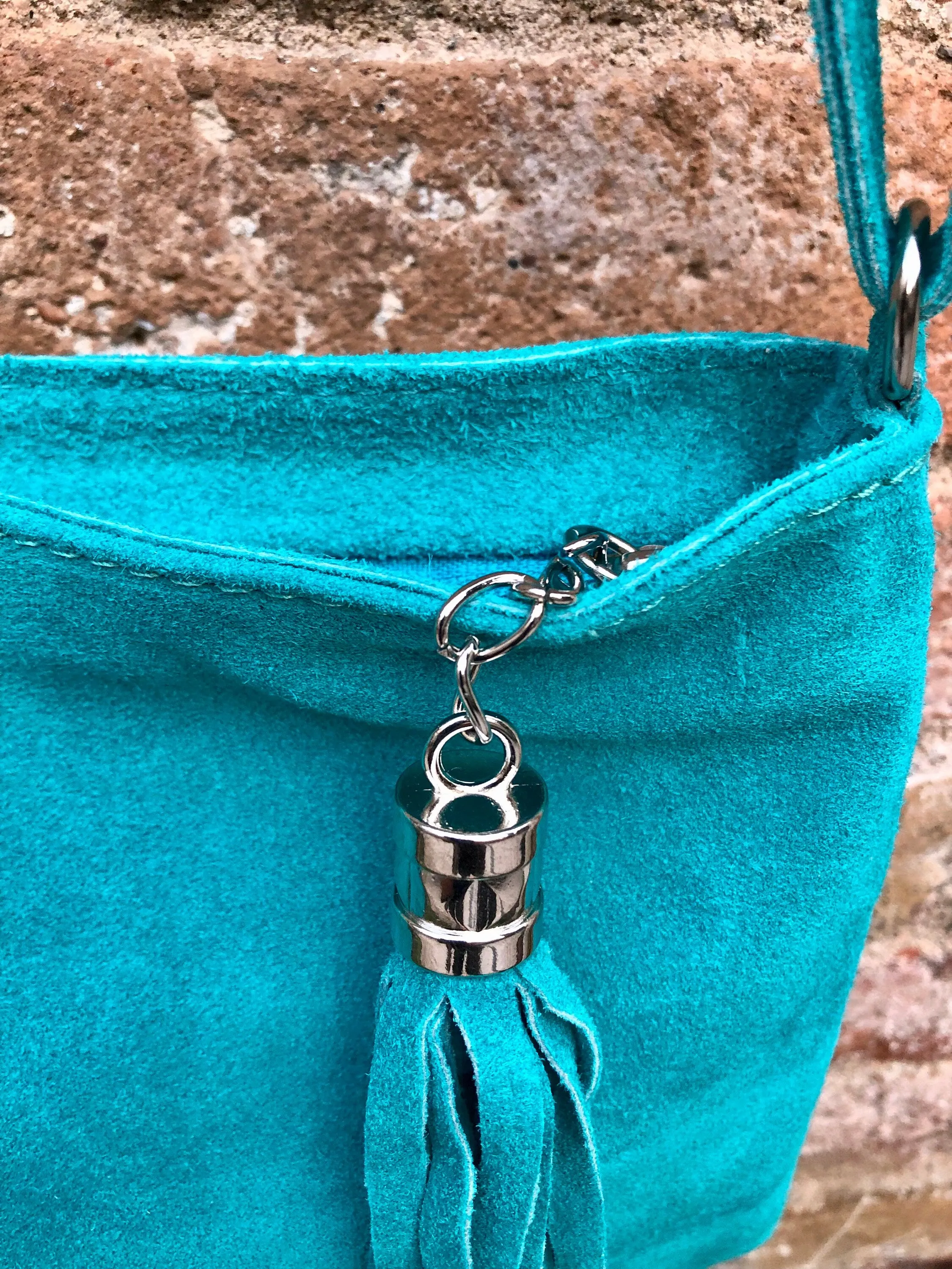 TURQUOISE suede leather bag. GENUINE  leather small crossbody / shoulder bag.Adjustable strap and zipper. Turquoise blue purse with tassel.