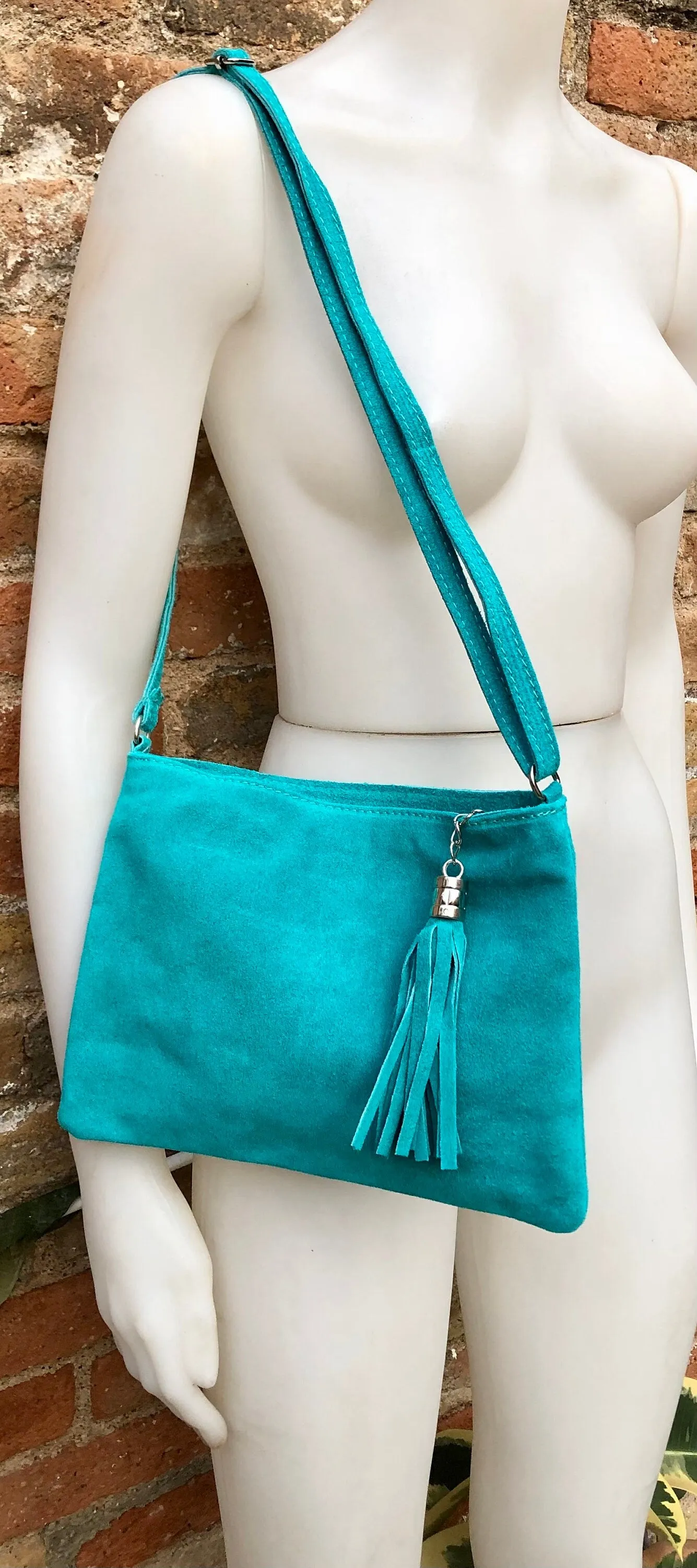 TURQUOISE suede leather bag. GENUINE  leather small crossbody / shoulder bag.Adjustable strap and zipper. Turquoise blue purse with tassel.