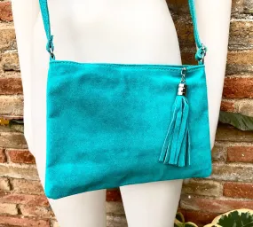 TURQUOISE suede leather bag. GENUINE  leather small crossbody / shoulder bag.Adjustable strap and zipper. Turquoise blue purse with tassel.
